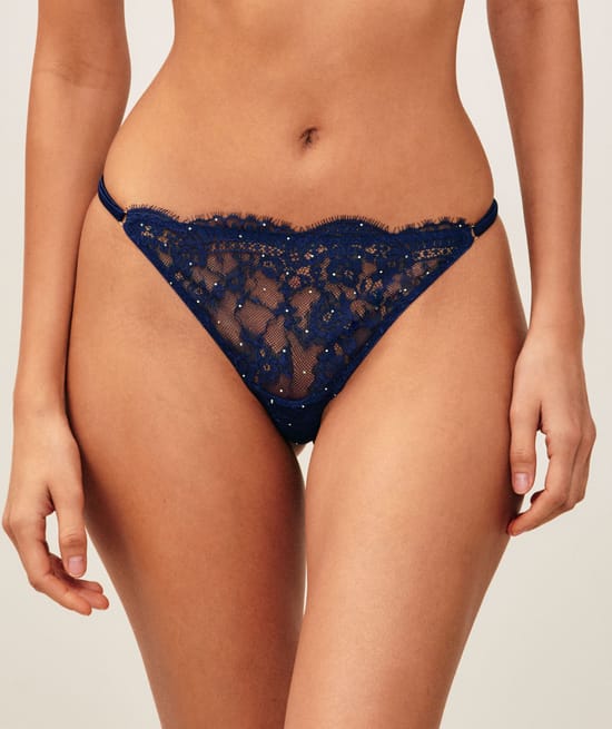 String in lace with silver rhinestones;