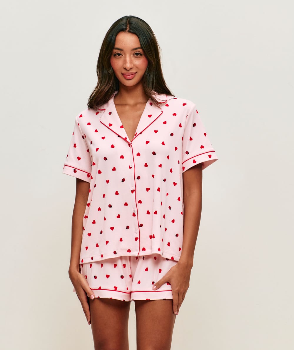 Ribbed jersey shorts with heart and ladybug patterns;