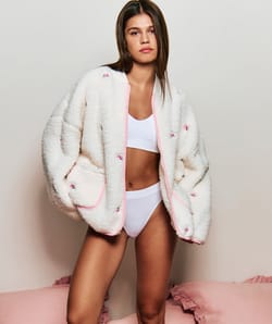 Fleece jacket with embroidered floral patterns;