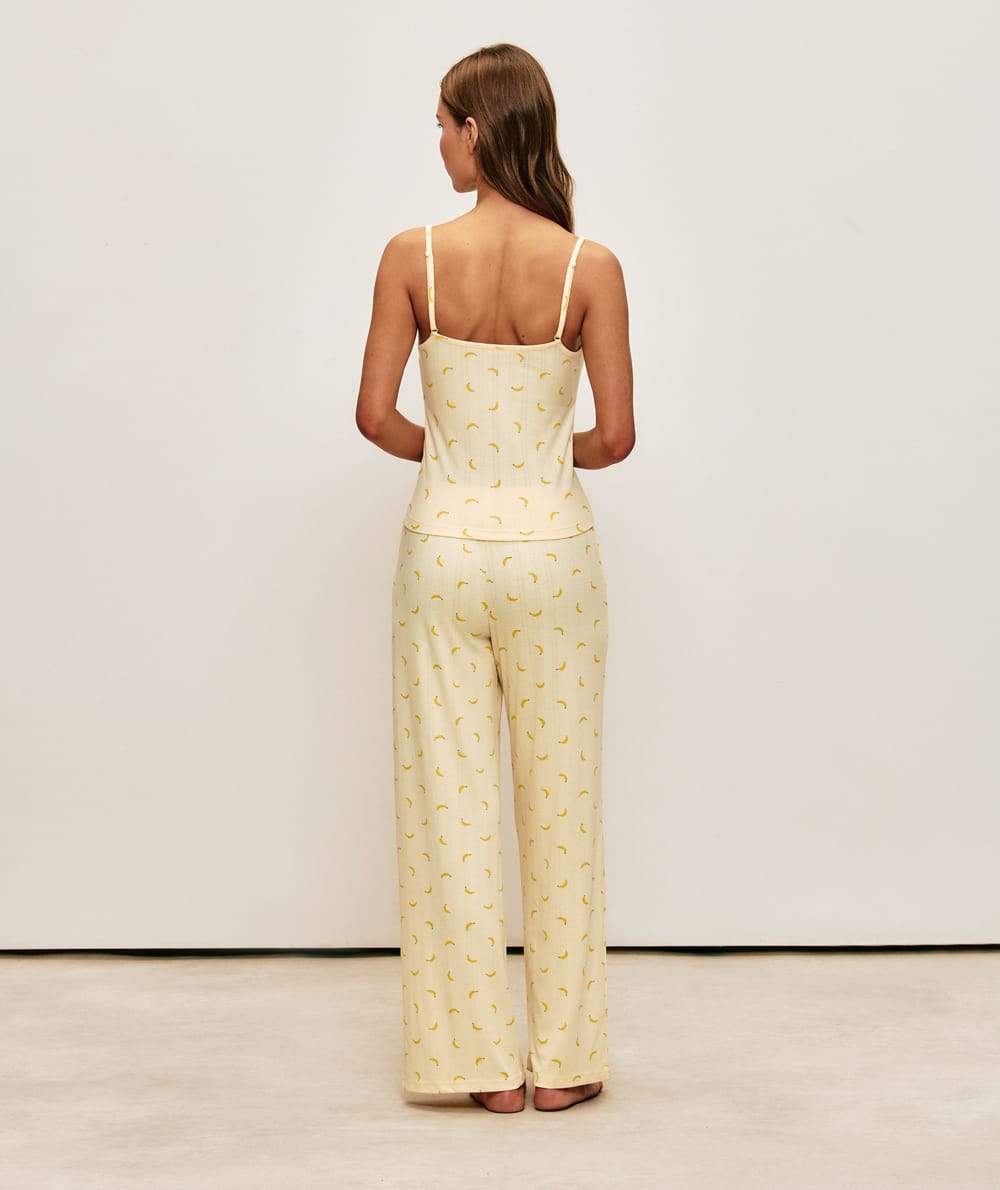 Corduroy jersey pants with banana patterns;