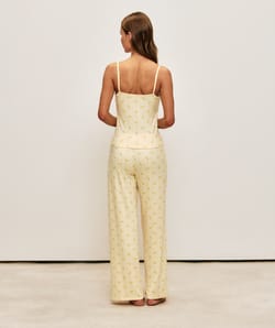 Corduroy jersey pants with banana patterns;