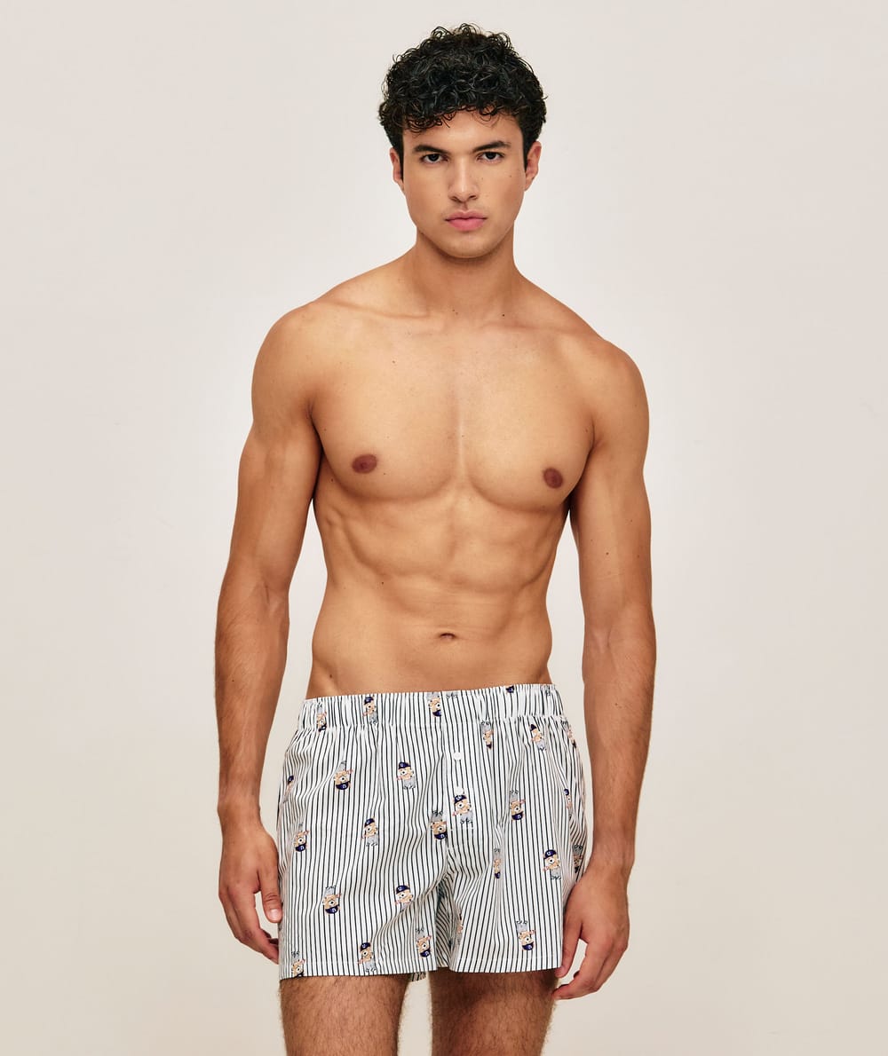 Striped cotton boxer shorts with bear patterns;