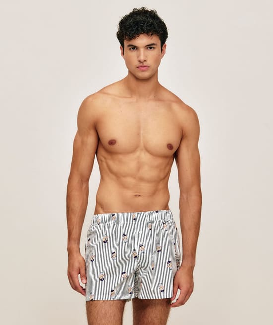 Striped cotton boxer shorts with bear patterns;