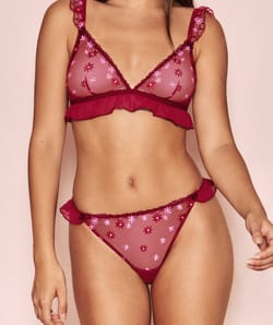 Brief with embroidered floral patterns;