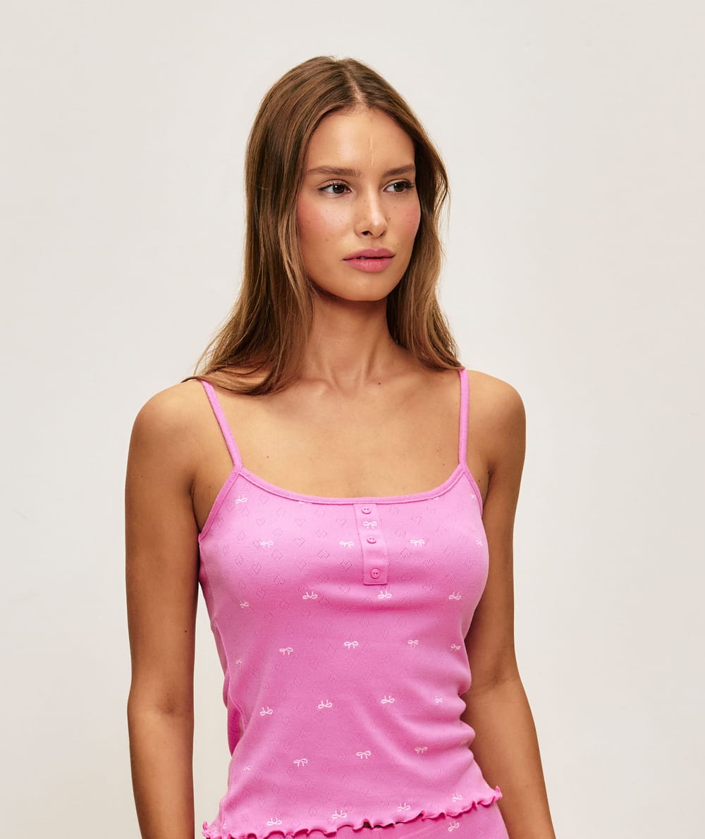 Cotton pointelle top with knot print;