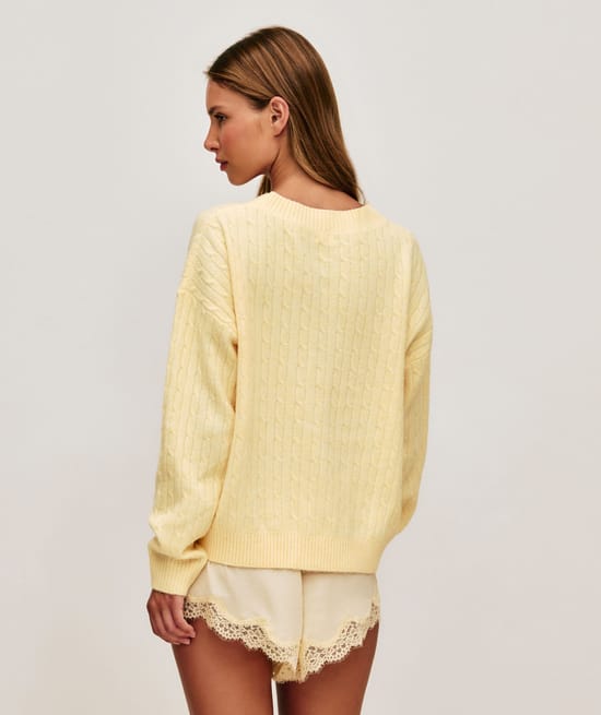 Cardigan en maille torsad&eacute;e Champion;