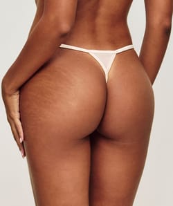 Tulle thong with star embroidery;