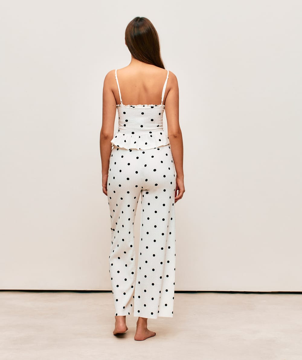 Textured fabric caraco with polka dot patterns;