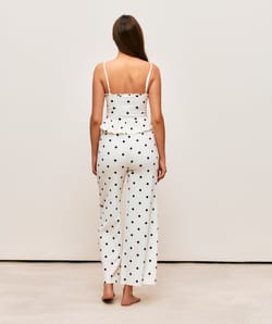 Textured fabric caraco with polka dot patterns;