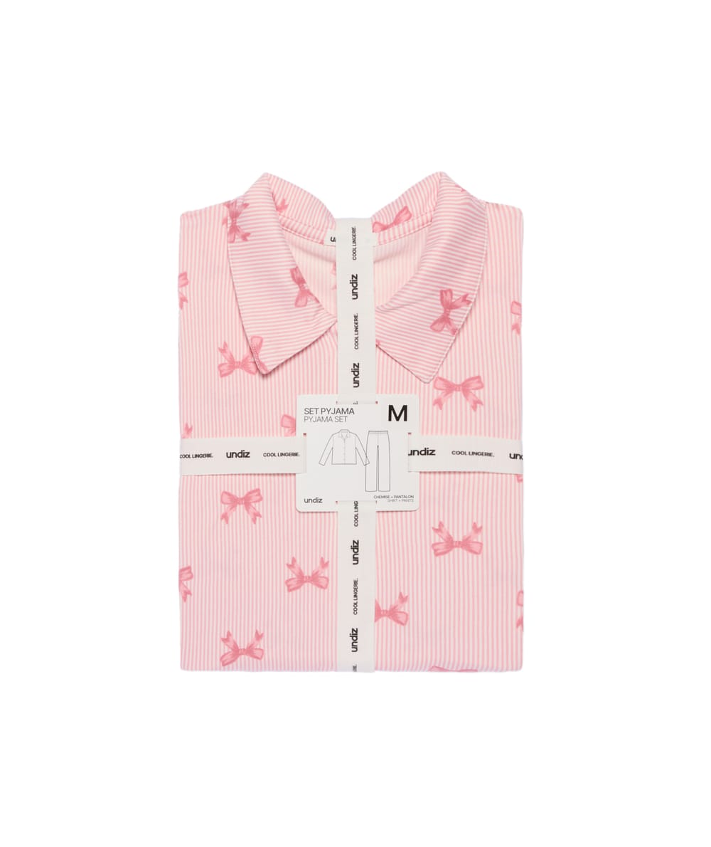 Striped shirt and pants set with tiny bows;