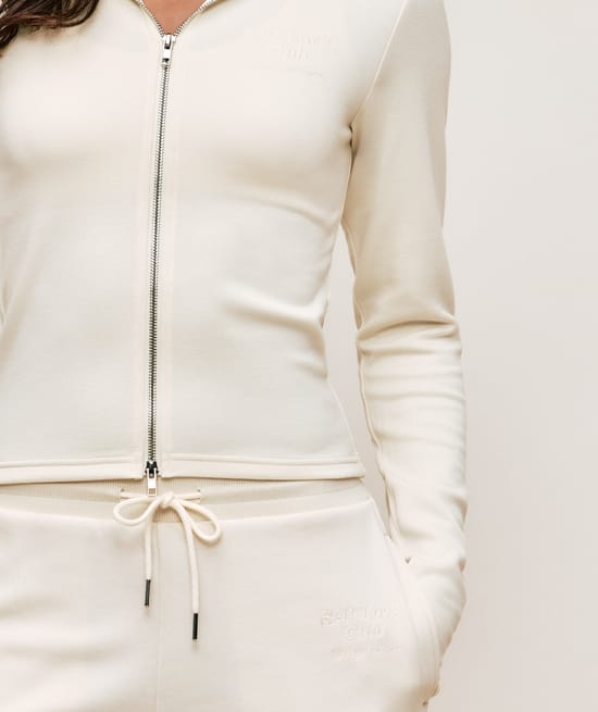 Jacket with Self Love Club embroidery;