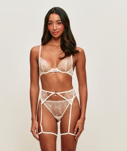 Mesh balconette bra with floral embroidery and pearl pendant;