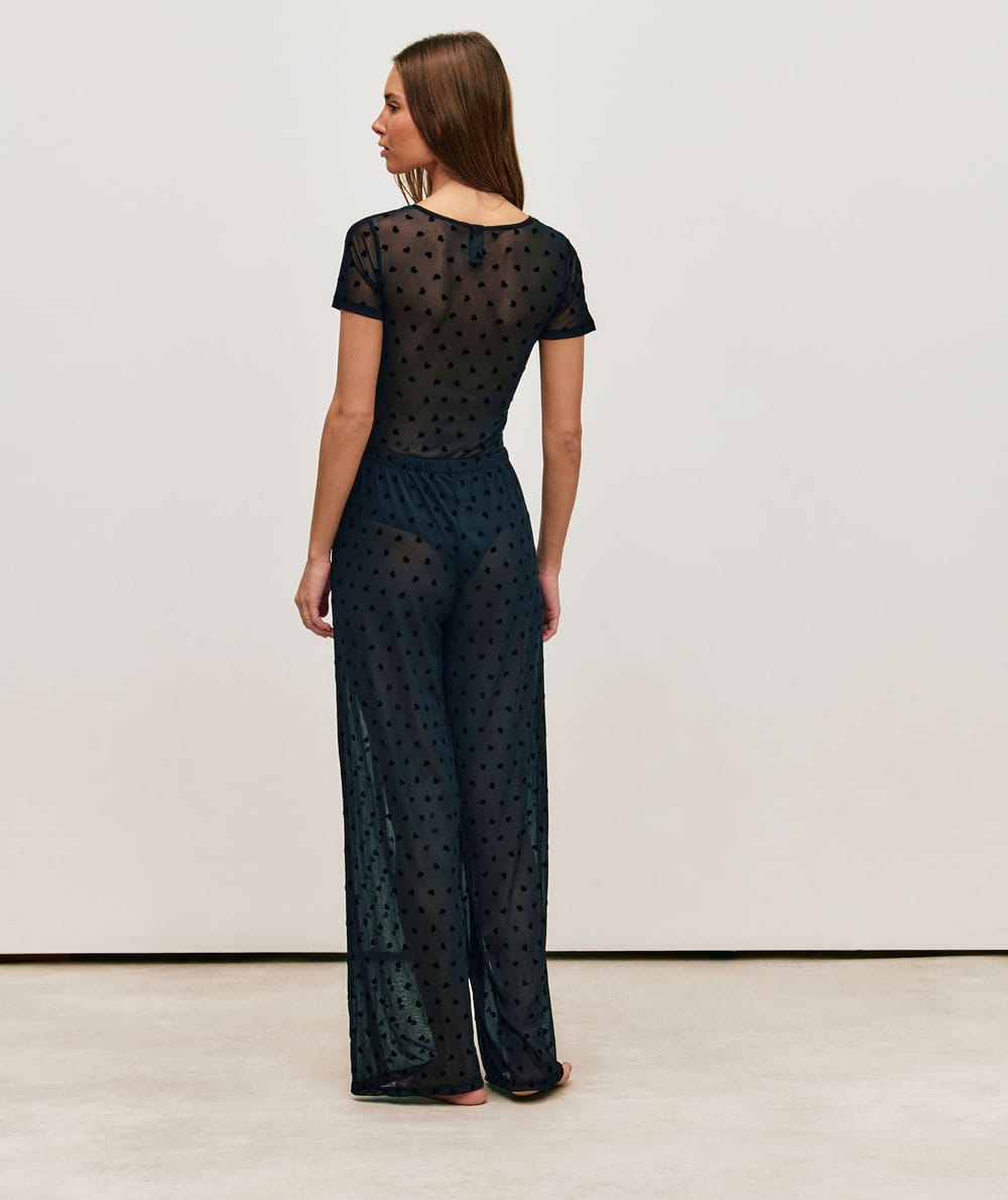 Heart pattern mesh trousers;