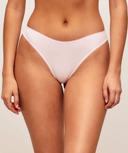 Microfiber and mesh thong with embroidered hearts and ladybugs;