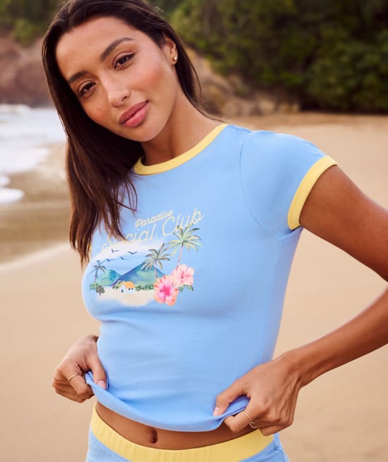 Jersey T-shirt with tropical print and 'PARADISE SOCIAL CLUB' inscription;