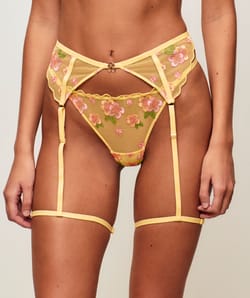 Tulle garter belt with floral embroidery;