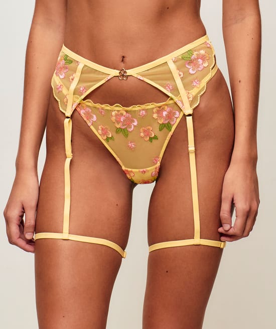 Tulle garter belt with floral embroidery;