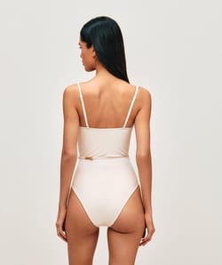 One-piece swimsuit with belt and golden jewel;