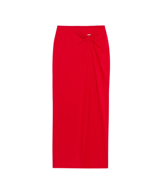 Long skirt with golden ring;