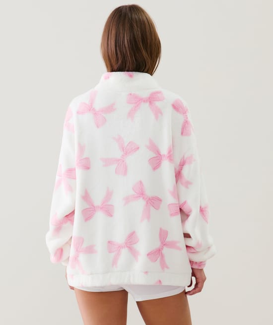 Fleece jacket with bow pattern;