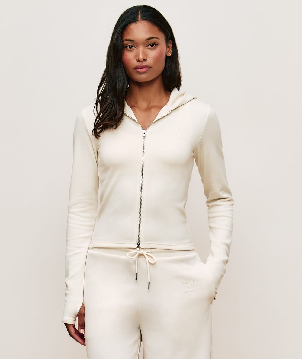 Trousers with Self Love Club embroidery;