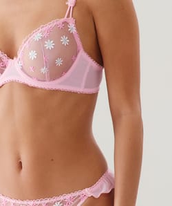 Balconette bra with embroidered floral patterns;