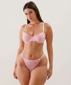 Balconette bra with embroidered hearts pattern;