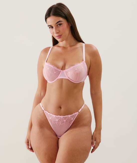 Balconette bra with embroidered hearts pattern;