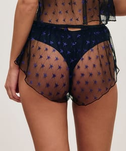 Mesh shorts with star embroidery;
