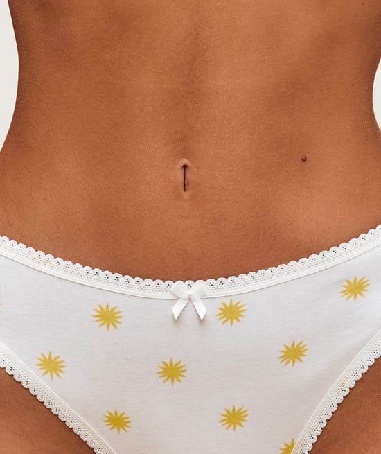 Cotton thong with sun patterns;