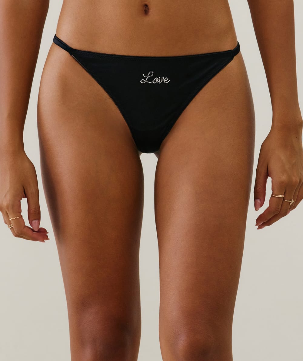 Tanga en microfibre et dentelle;