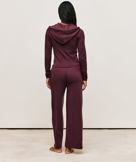 Trousers with Self Love Club embroidery;