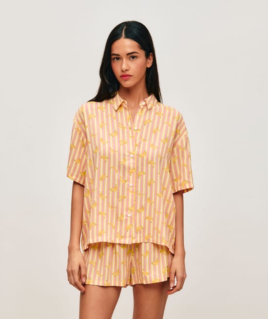 Striped shirt and shorts set with banana patterns;