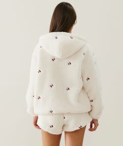 Sherpa jacket with cherry embroidery;