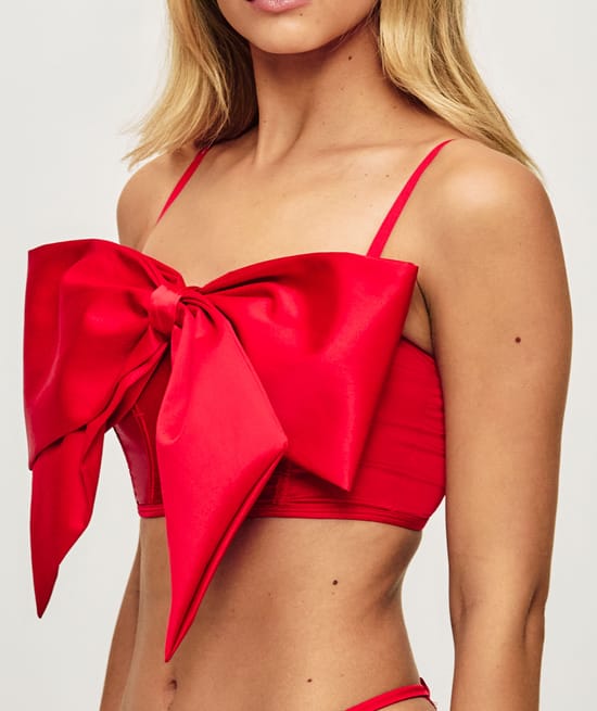 Red satin bow bustier;