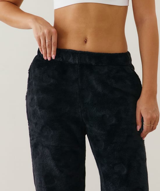 Fleece trousers with heart pattern;