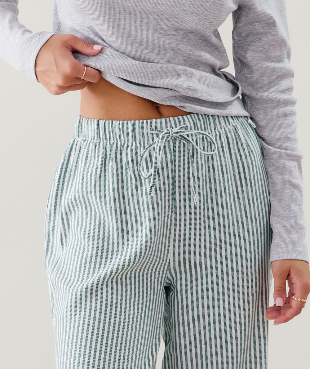 Striped flannel trousers;