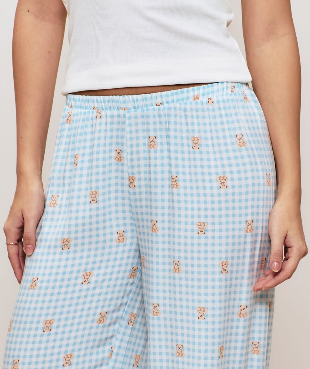 Check trousers with teddy bear pattern;