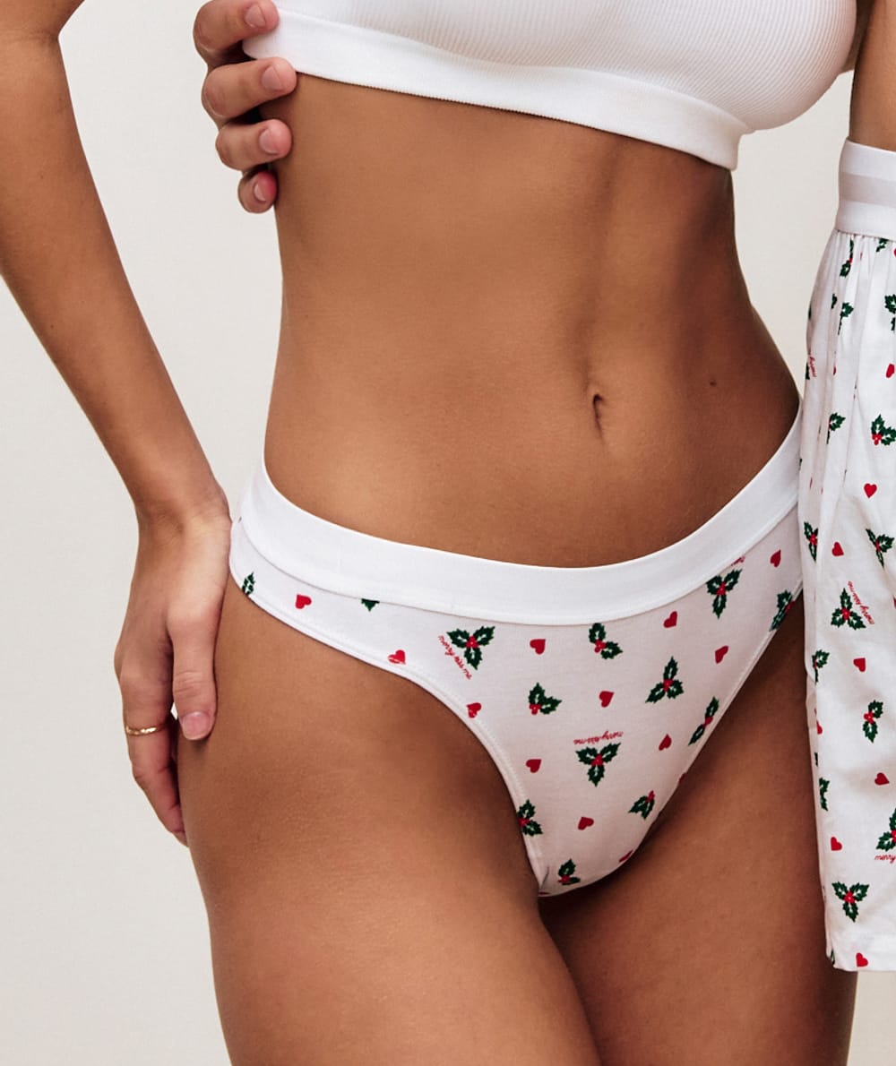 Cotton thong with holly and heart pattern;
