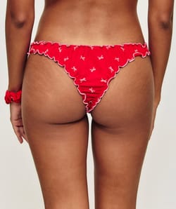 Thong and scrunchie set with bow pattern;