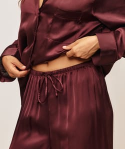 Satin pants;