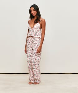 Light poplin top with strawberry and ladybug patterns;