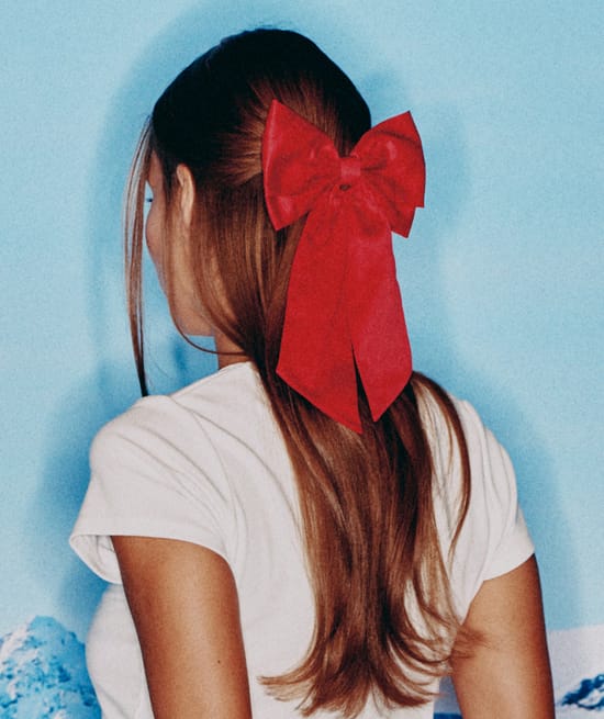 Red satin bow hair clip;