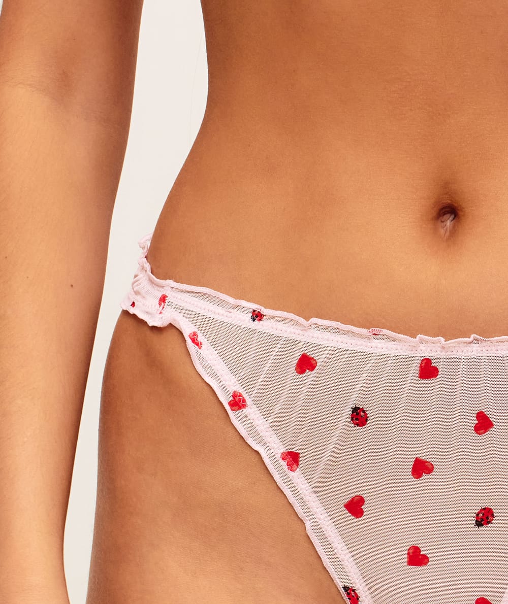 Tulle string with heart and ladybug patterns;