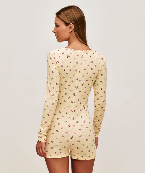 Floral knitted playsuit;