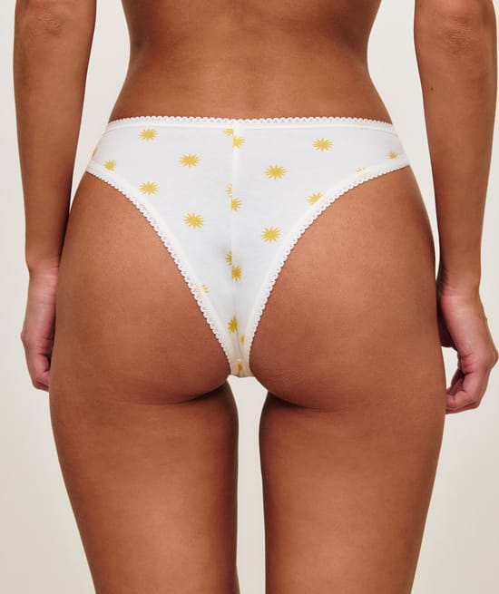 Cotton thong with sun patterns;