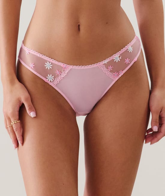 Brief with embroidered floral patterns;