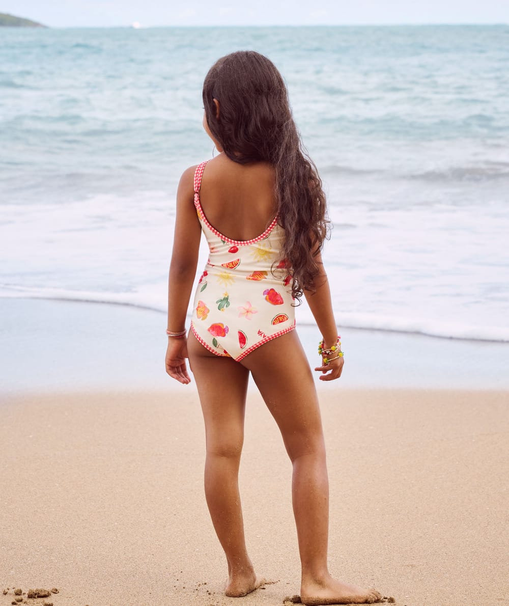 Kids' one-piece swimsuit with fruity and floral pattern;