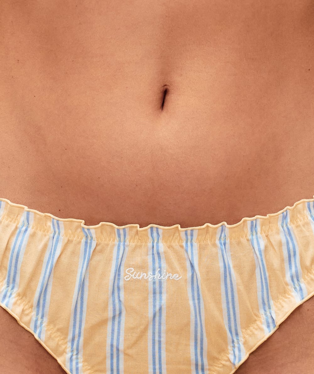 Striped cotton string with 'sunshine' embroidery;