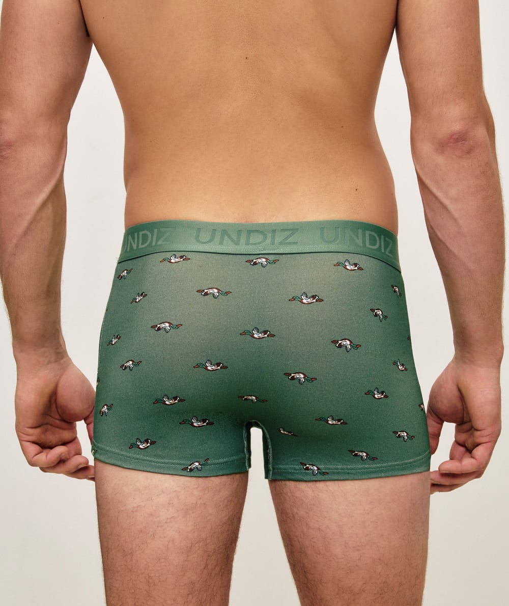 Green cotton boxer shorts with duck patterns;